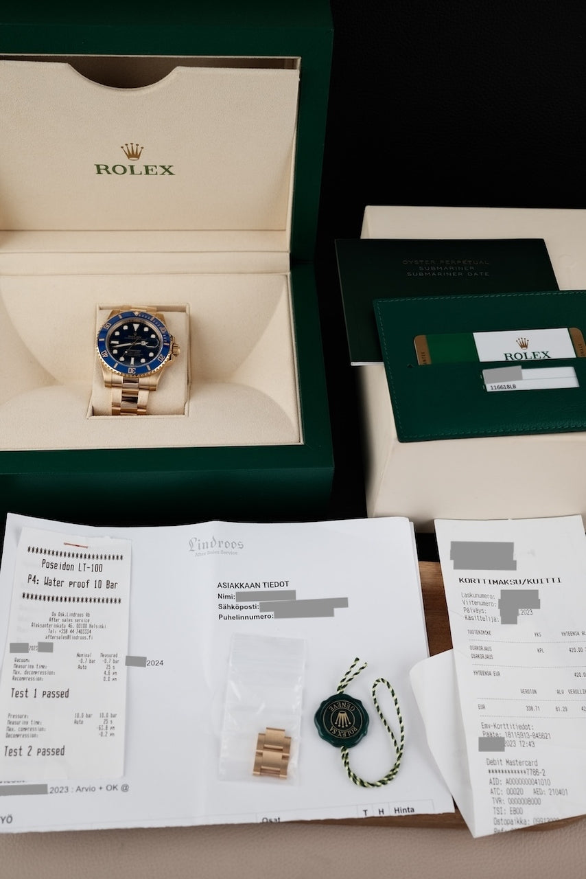 Rolex Submariner Date 116618LB - Papiere und oder Lieferumfang