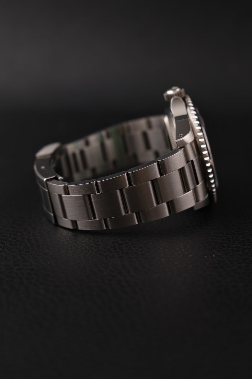 Rolex Submariner Date 16610 Box + og. Papiere First Buyer's Invoice, LC100, SERVICED, Tritium, S-Series