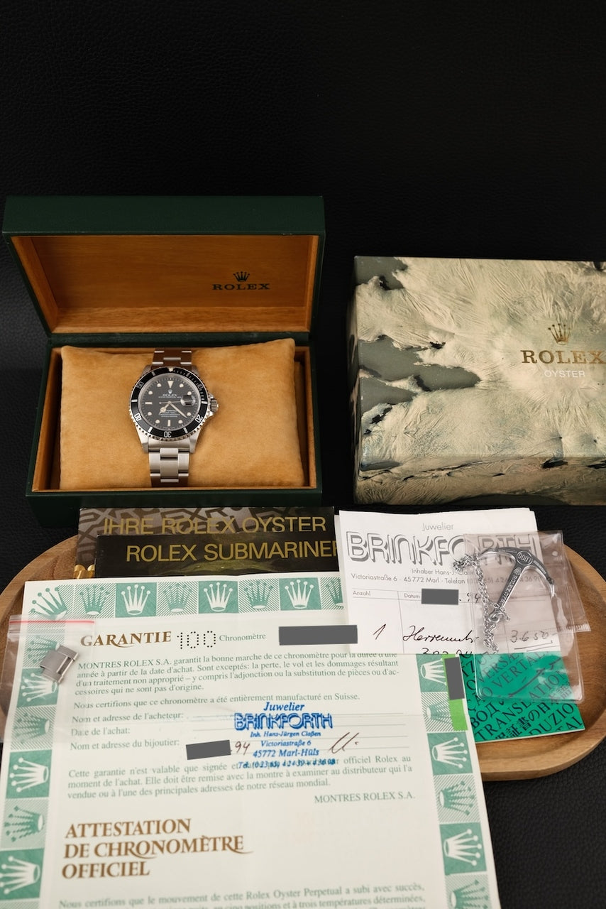 Rolex Submariner Date 16610 Box + og. Papiere First Buyer's Invoice, LC100, SERVICED, Tritium, S-Series