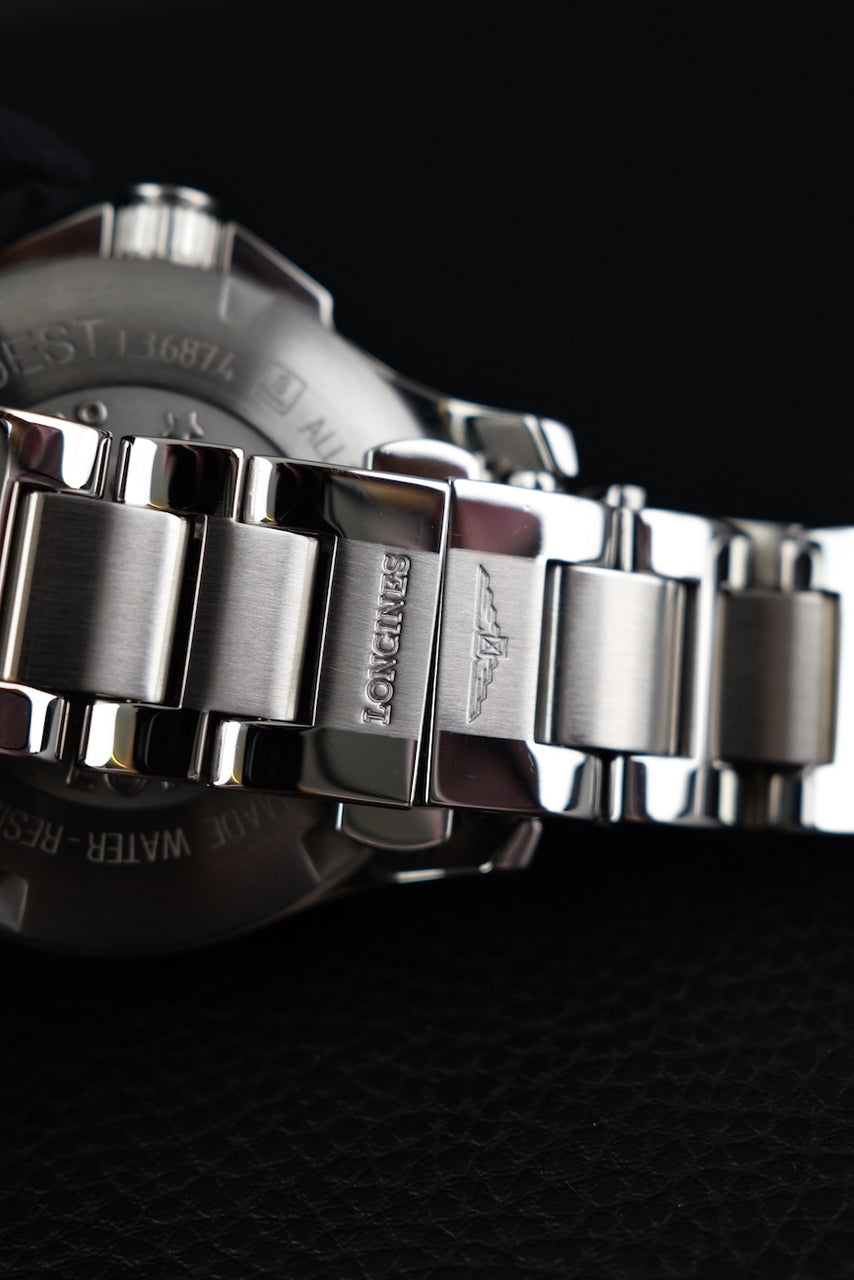 Longines Conquest GMT L3.687.4.99.6 Box + og. Papiere 2024 Longines Service, German Delivered