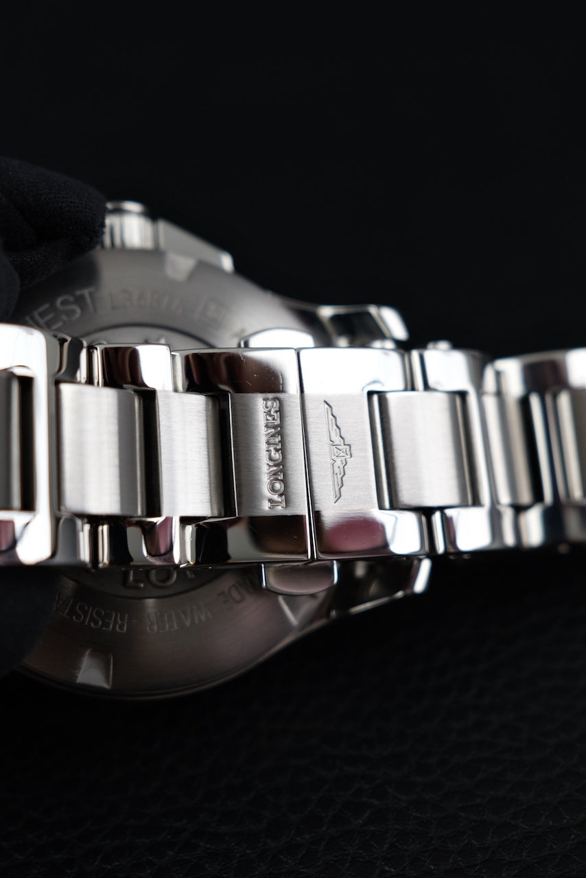 Longines Conquest GMT L3.687.4.99.6 Box + og. Papiere 2024 Longines Service, German Delivered