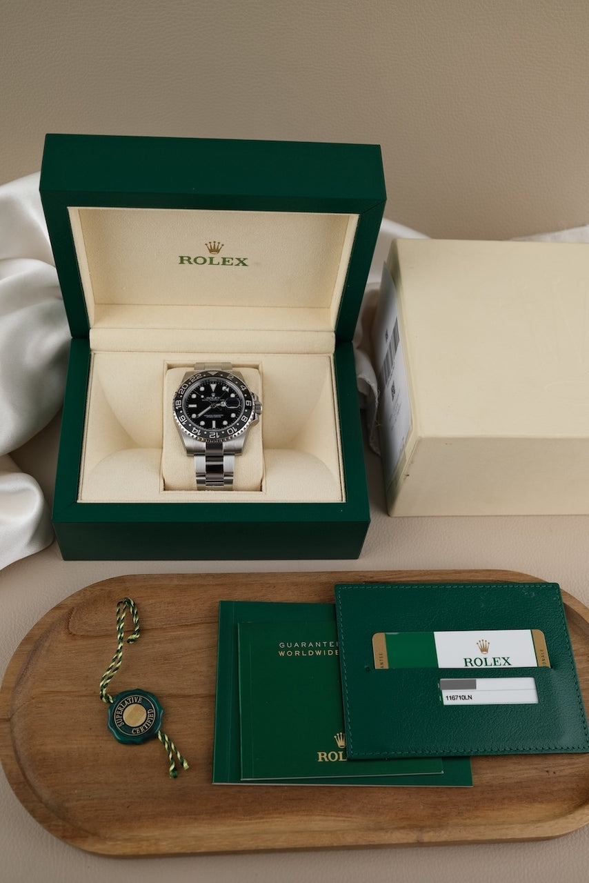 Rolex GMT-Master II 116710LN Box + og. Papiere NOS Unworn, Partly Stickered