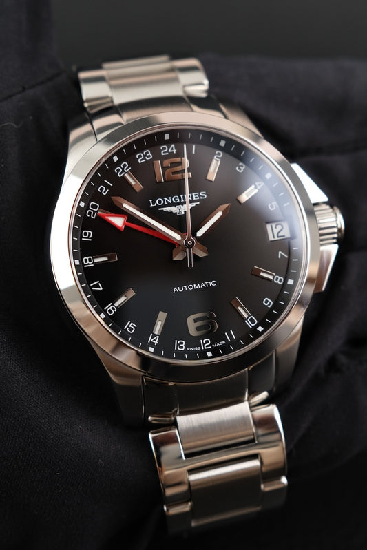 Longines Conquest GMT 41 L36874566 Box + og. Papiere 2025, German Delivered, Black Dial