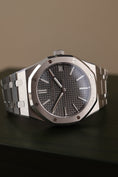 Load and play video in Gallery viewer, Audemars Piguet Royal Oak 41mm 15510ST Box + og. Papiere Grey Dial NEW 2024 German First Buyer´s Invoice
